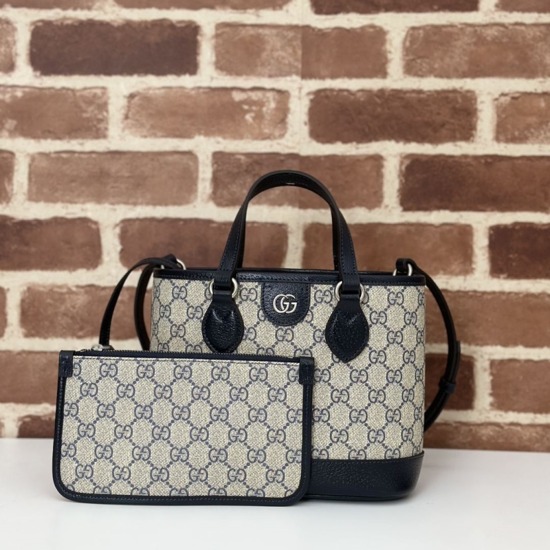 G*u*i shopping bags